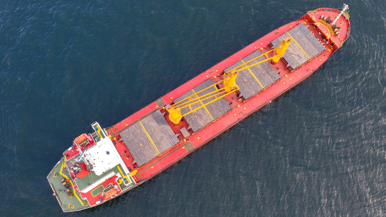 Aerial view of cargo ship shutterstock_2284507453